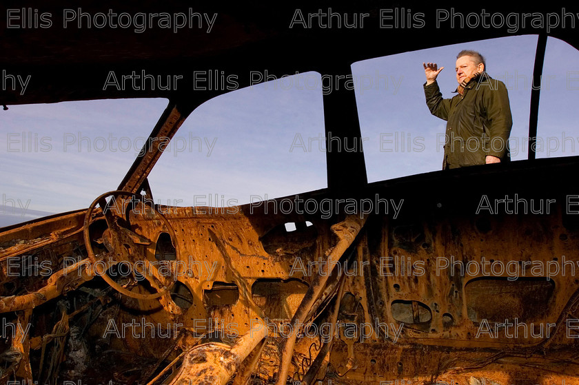 WEBSITE PIX 018 
 Carigaholt resident Gerry Nestor at the point on the Kilkee to Loop Head Coast road where burnt out cars have been left for the past couple of months.Pic Arthur Ellis.