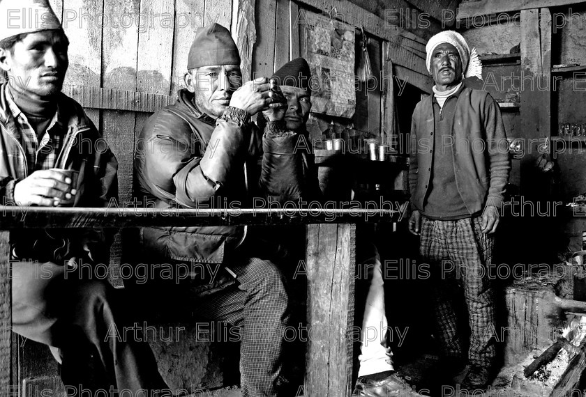 Nepal 7x 
 020106
L-R Moti Ram Budha,30,Engineer, Dhan Bahadur Thapa,49,Farmer, Daya Datta Hamal,44, Political Party Worker seek the refuge and warmth of Jaya Bahadur Mallas (far right) Shop and Tearooms for a warm glass of tea (tea is served with a spoon of coffee added for extra stimulation).
Late snows in Jumla last year caused most of the rice harvest in the valley to be destroyed leading to extreme poverty and hunger in the area.Concern Worlwide have set up an agency in the capital Kathmandu to help the poorest of people to help themselves by training and education.Food Security , Health and Sanitation and Livlihood are the biggest problems facing these mountain people.Pic Arthur Ellis/Press 22.

For further info contact
Dominic Crowley,Concern 01 4177749
Gerry Reynolds Concern 01 4177700