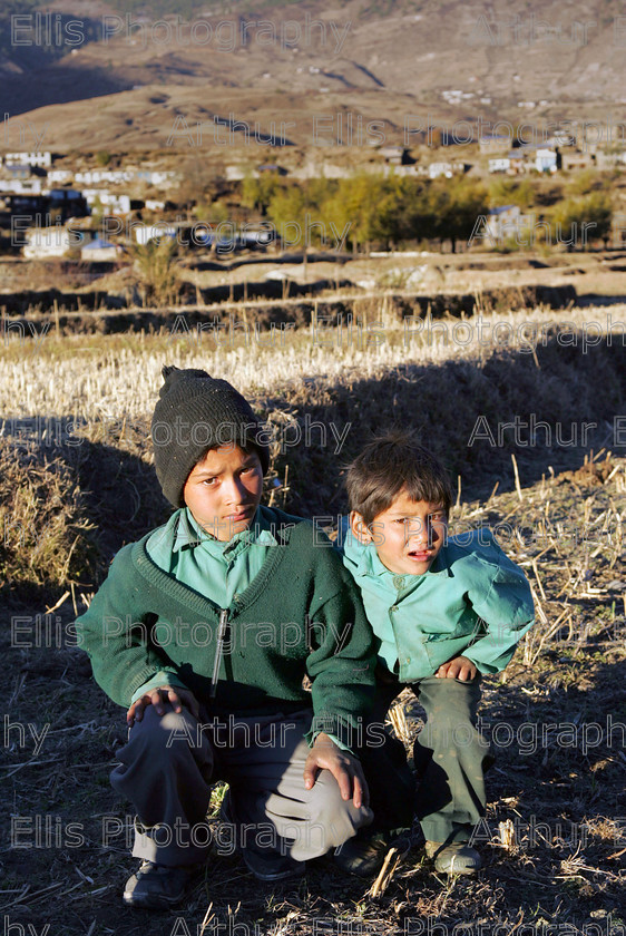 Nepal 20 
 020106
Two young boys make their way to school in Jumla North West Nepal.Late snows last year caused most of the rice harvest in the valley to be destroyed causing extreme poverty and hunger in the area.Concern Worlwide have set up an agency in the capital Kathmandu to help the poorest of people to help themselves by training and education.Food Security and Health and Sanitation are two of the biggest problems facing these mountain people.Pic Arthur Ellis/Press 22.

For further info contact
Dominic Crowley,Concern 01 4177749
Gerry Reynolds Concern 01 4177700